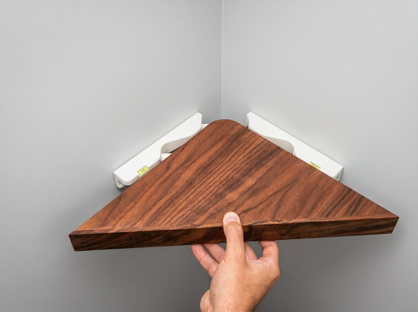 <p>A floating corner shelf. No screws. No trace.</p>